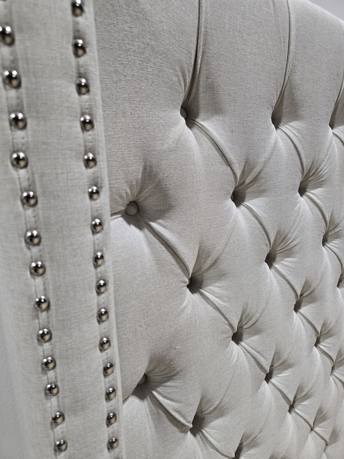 Hugh Tufted Wingback Linen Platform Bed